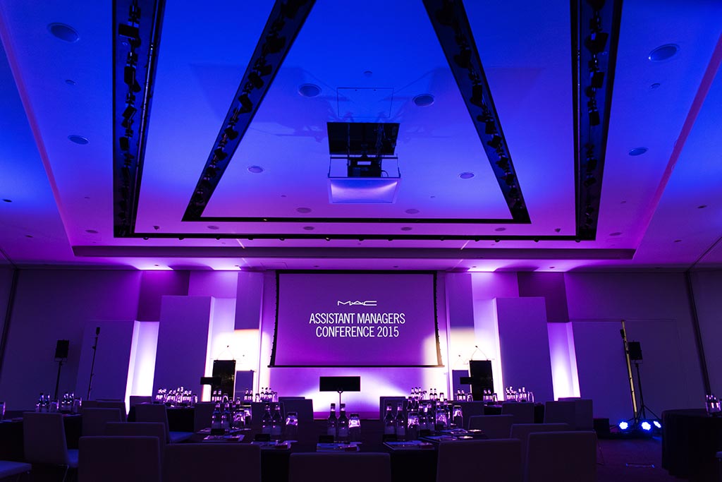 Rob Cartwright Photography MAC make up cosmetics beauty retail colour luxury goods ME hotel strand london conference meeting room wide angle low blue purple lighting stage set up branchout productions av event